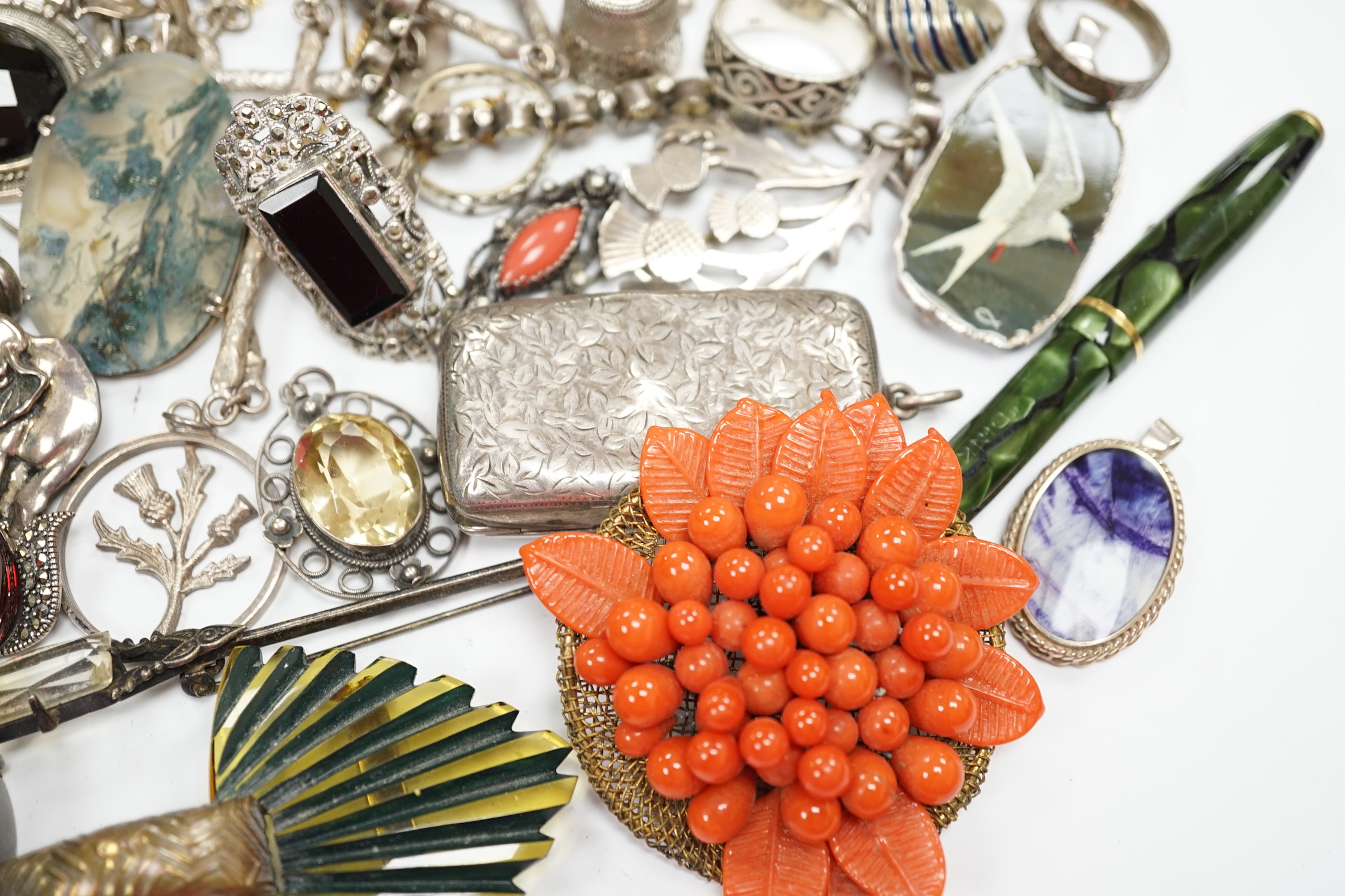 A quantity of assorted mixed silver, jewellery and other items including a sterling and enamel drop pendant, coral, silver brooches, Norwegian sterling and enamel flower brooch, fountain pen, pencils, cufflinks, silver s